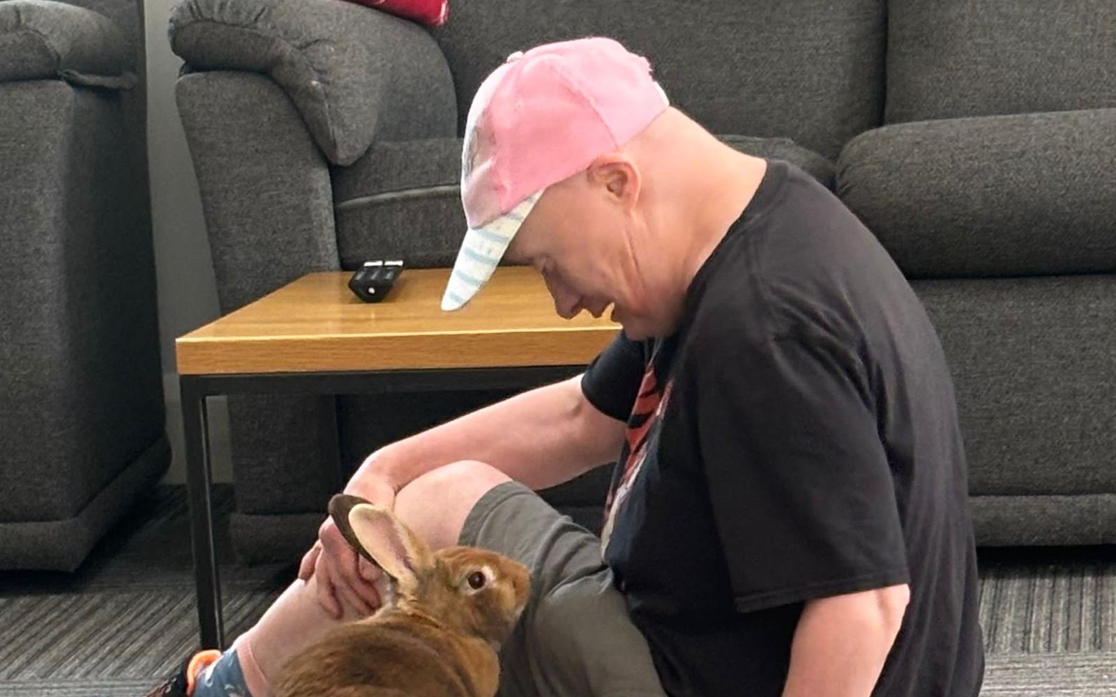 A resident enjoying an activity session at Gow Lodge